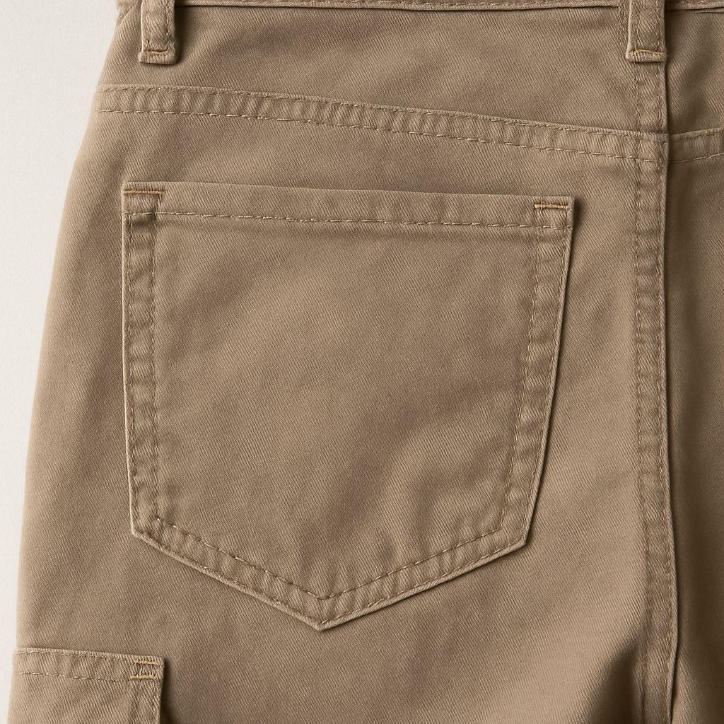 Close-up of back pocket stitching on women’s handmade khaki utility pants